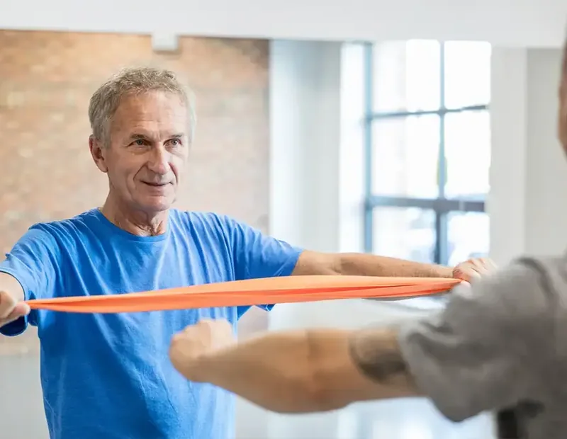 A patient working through a guided balance and coordination exercise